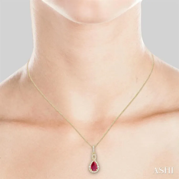 7x5 MM Pear Shape Ruby and 1/3 Ctw Diamond Pendant in 14K Yellow Gold with Chain